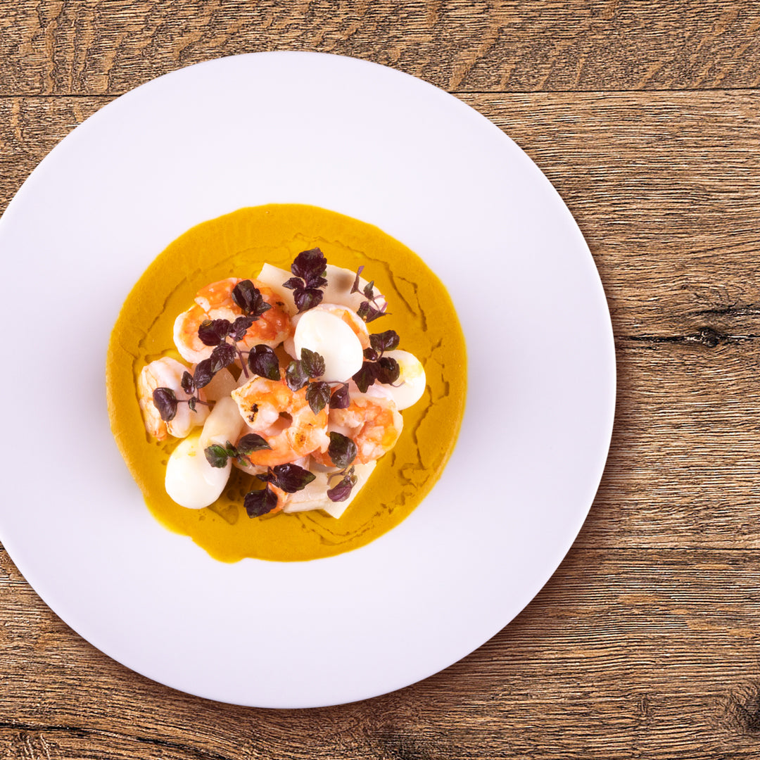 Gamberoni, salsa al curry e uova di quaglia di Morgan